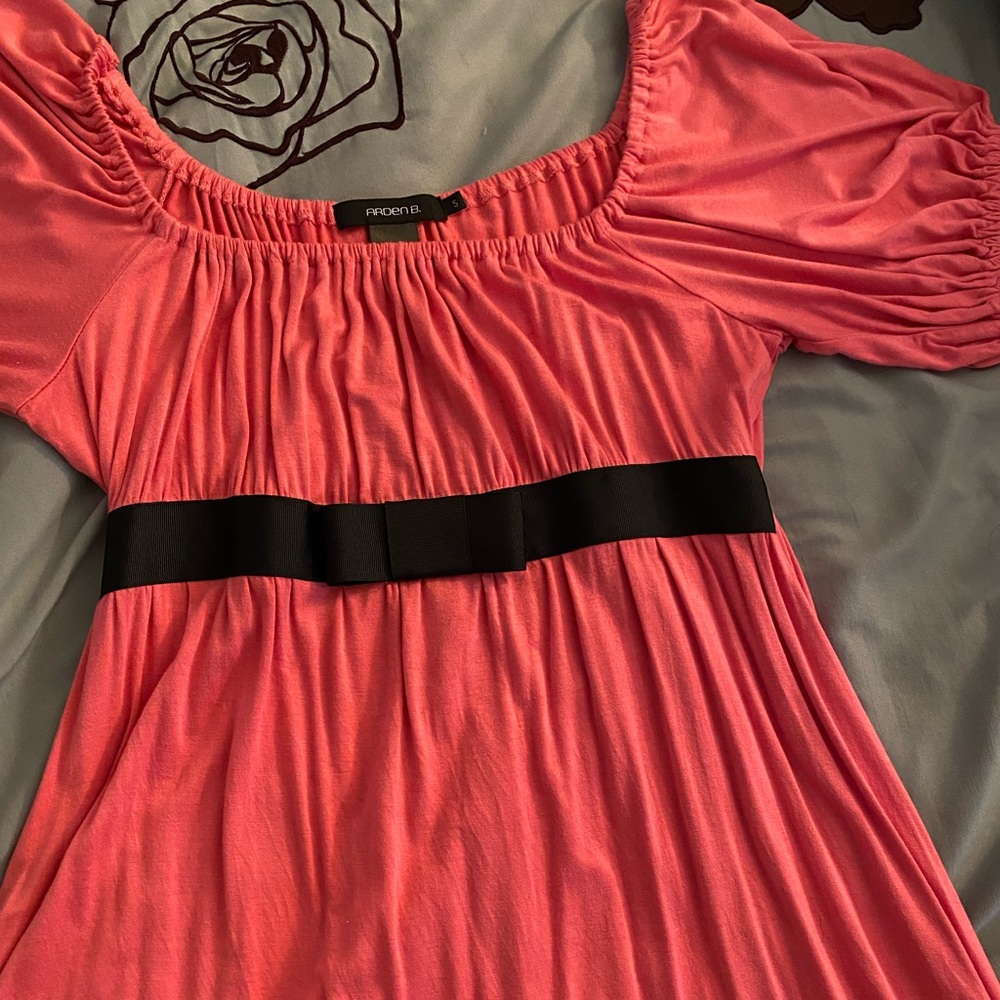 Pink Arden B shirt with black bow accent in front